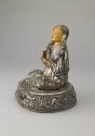 Tsongkhapa (1357-1419); Tibet; 16th century; silver, copper, and enamel with semiprecious stone…